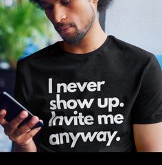 "Invite Me Anyway Tee | Party Invite T-Shirt. I know that I rarely show up. Invite after invite, I'm not \"feeling well\" or \"I have to work\". So what? Invite me anyway. Will I show up? Probably not. But you don't know that. You don't know my life. Maybe I will this time. Probably not. Imma still need that invite. .: Unisex .: Tear away label .: Runs true to size Tee L, in W, in Sleeve L, in S 28.51 18 7.25 M 29.49 20 7.76 L 30.52 21.97 8.23 XL 31.5 23.98 8.75 2XL 32.52 25.99 9.26 3XL 33.51 28 Funny Short Sleeve T-shirt For Party, Slogan Crew Neck Top For Party, Cotton T-shirt With Text Print For Party, Party Slogan Cotton T-shirt, Party Cotton T-shirt With Slogan, Crew Neck Cotton T-shirt For Party, Cotton Crew Neck T-shirt For Party, Funny Print Crew Neck T-shirt For Party, Funny Party T-shirt With Crew Neck