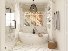 a bathroom with marble walls and flooring is shown in this image, there are candles on the counter next to the bathtub