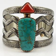 Wide Tufa Cast Sterling Silver Cuff with Cut-Out Design and set with Mediterranean Coral and Natural Royston Turquoise in 14k Gold Bezels. This piece also features 14k Gold beads. 2” Cuff Width5.5 Inside Measurement, plus 1 opening(6.5" Total Circumference - Medium) Turquoise Jewelry Native American, American Indian Jewelry, Turquoise And Coral, Native American Turquoise, Royston Turquoise, Cut Out Design, Coral Turquoise, Sterling Silver Cuff, Native American Jewelry