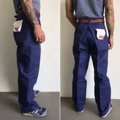 "French blue work trousers - Macober Made in France 1970s High waist pants in indigo blue sanforized cotton . Straight cut with crease. 5 button closure. Bakelite buttons. All originals. 2 side pockets, 1 buttoned back pocket. 5 belt loops. In perfet condition. New item. Deadstock With original cardbord label . Never washed. Label size: 42/10 The model usually wears a size M (40/42) and measurs 175cm - 68,8,\" Measurements (flat): Waist: 40cm - 15,7\" Hips: 57cm - 22,4\" Crotch: 34cm - 12,5\" fr Retro Blue Straight Leg Pants, Retro Cotton Jeans For Work, Retro Blue Bottoms With Pockets, Retro Blue Jeans For Work, Vintage Blue Bottoms With Side Pockets, Retro Work Pants For Workwear, Vintage Cotton Jeans With Welt Pockets, Blue Work Pants With Belt Loops, Vintage Cotton Jeans For Work