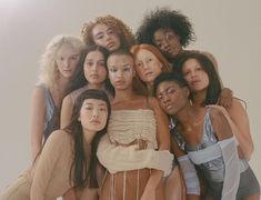 a group of women posing for a photo together