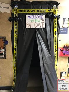 a bat cave is decorated with black and yellow tape to welcome the bats in this classroom