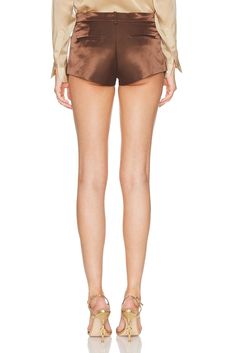 Find TOM FORD Duchesse Mini Short In Brown on Editorialist. TOM FORD Duchesse Mini Short in Brown 72% cotton 28% viscose Self 2: 59% cupro 41% silk. Made in Italy. Dry clean only. Zip fly with hook and bar clasp closure. Front pockets and back welt pockets. TFOF-WF22. SH0054-FAX1189. About the designer: Tom Ford lends a contemporary elegance to all things sartorial. Raised in Santa Fe, Ford made a name for himself as creative director at Gucci, where he transformed the house of fashion into a thriving 21st century brand before going on to launch his own wildly successful label in 2005. Today, Tom Ford is coveted for everything from its statement sunglasses and fine leather accessories to its glamorous dresses and impeccably tailored suits. A Tom Ford design is an exquisite balance of timel Luxury Fitted Satin Bottoms, Fitted Luxury Satin Bottoms, Luxury Fitted Silk Bottoms, Luxury Silk Bottoms For Summer, Fitted Silk Bottoms Short Length, Statement Sunglasses, Glamorous Dresses, Mini Short, Tailored Suits