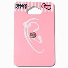 a pink hello kitty phone case with a bow on the front and an ear clip attached to it