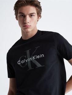 Designed with short sleeves and a crewneck, this t-shirt features CK monogram logo styling at the front. Crafted completely from cotton for soft, comfortable wear.  Material: 100% Cotton. Basic Crew Neck Calvin Klein T-shirt, Basic Calvin Klein Crew Neck T-shirt, Classic Calvin Klein Short Sleeve T-shirt, Calvin Klein Relaxed Fit Crew Neck T-shirt, Classic Calvin Klein Crew Neck Top, Modern Logo T-shirt For Streetwear, Streetwear Monogram Print Short Sleeve T-shirt, Short Sleeve Monogram Print T-shirt For Streetwear, Summer Streetwear T-shirt With Monogram Print