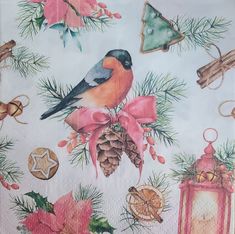 a bird sitting on top of a table covered in christmas decorations and pine cones with pink bows