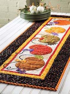 a table runner is shown on the screen