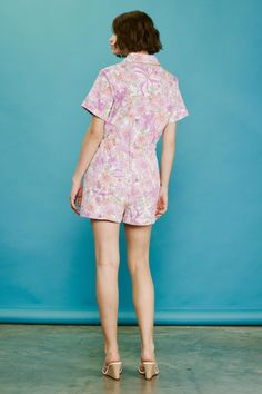 A playful take on effortless dressing, this short-sleeve twill romper showcases a retro-inspired floral print in a pastel color palette. It buttons at the front and features a pointed collar, patch pockets, and an elasticized waist to define the shape. •Short sleeves •Pointed collar •Button placket •Patch pockets •Elasticized waist Item Number: 74402 Pastel Color Palette, Pastel Colour Palette, Retro Floral, Button Placket, Retro Inspired, Item Number, Pastel Colors, Occasion Dresses, Patch Pocket