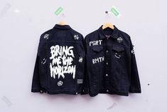 "Get your cool jacket with bring me the horizonand stand out! rock band edition painted jacket The painting is made with special acrylic paint for fabric It can be performed on a women's or men's jacket of any size Experience the Perfect Blend of Music and Style with our Hand-Painted \"Bring Me the Horizon\" Denim Jacket. Rock out in style with this custom hand-painted denim jacket featuring the iconic logo and artwork of the popular rock band, Bring Me the Horizon. Each brushstroke is carefully applied by our skilled artists, bringing the band's electrifying energy to life on this unique piece of wearable art. Details - unisex fit - 100% denim - see photos for size guide WASH & CARE Each jacket is handmade with care, so please treat it as so! Best to spot clean or dry clean - please ask d Mens Painted Denim Jacket, Black Denim Jacket Customized, Band Jean Jacket, Black Denim Jacket Men, Punk Denim Jacket With Graphic Print, Grunge Denim Jacket With Graphic Print, Denim Jacket Men Outfit, Varsity Jacket Outfit, Denim Jacket And Jeans