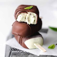 chocolate covered ice cream sitting on top of a table