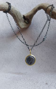 This gold plated and rodium plated silver locket necklace which looks like an antique coin is handmade and unique. I used sterling silver (925K) and antique coin made with casting technique in silver smithing. The pendant is rodium plated and the outer circumference of the coin is gold plated. Caesar pictured on coin pendant. It can be a stylish gift alternative for yourself or for vintage, retro jewelry lovers. Length of the necklace is 65 cm. Radius of the coin pendant are 1,5 cm. All items ar Silver Smithing, Silver Coin Necklace, Silver Locket Necklace, Silver Locket, Antique Coins, Retro Jewelry, Silver Lockets, Silver Coin, Coin Necklace