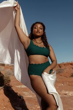 Ready to run into Summer? So are we, and this beautiful green hue is perfect for your summer wardrobe! Baltic Born exclusive style Pairs with our Honolulu High Waist Bikini Bottom in Green Classic bikini style with scoop neck and back Loop and hook closure at back Scalloped edges along neckline and back Removable cups for extra support Body: 94%, Polyester 6% Spandex Lining: 100% Polyester Trina is 5'6, cup size 32D, size 2 and is wearing size S Victoria is 5'7, cup size 34D, size 8/10 and weari Bikini Style, Baltic Born, Tan Body, Green Bottom, Scalloped Edges, Cup Size, Style Classic, Honolulu, Scalloped Edge