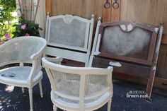 three white chairs sitting next to each other in front of a wooden wall with flowers