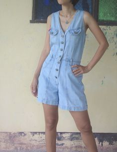 faded romper Vintage 80s JouJou jumpsuit size M, blue Jeans Romper, Denim Shorts Romper, Sleeveless Romper,hipster, cool jeans I want you to experience the beauty, style and comfort of my goods. condition : vintage good ( Rare ) color : Blue jeans Material : Denim fabric Label : jou jou size M ,W27 - 29 for women Please refer to the pictures for more details. / I check measurements centimeters or inches 1. bust up to 37 inch // 94 cm. 2. Waist: 27 or 29 inch // 68.5 or 73.7 cm 3. Hips: up 40 inc Casual Blue Sleeveless Shortalls, Casual Sleeveless Medium Wash Shortalls, Casual Medium Wash Sleeveless Shortalls, Vintage Light Wash Denim Overalls, Sleeveless Denim Jumpsuits And Rompers With Button Closure, Cotton Medium Wash Jumpsuits And Rompers With Buttons, Medium Wash Cotton Jumpsuits And Rompers With Buttons, Cotton Jumpsuits And Rompers With Buttons In Medium Wash, 90s Blue Cotton Denim Jumpsuit