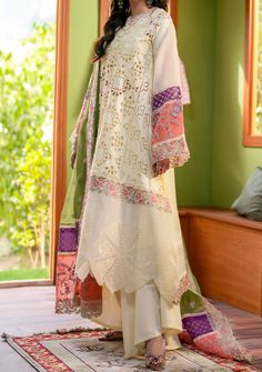 Introducing our Luxury collection'Luxury Lawn-24' by Maryum N Maria designed to make you look and feel your best. These pieces will add a touch of class and elegance to your wardrobe. This collection is a beautiful collection of ensembles offering versatile compositions for the latest festive wardrobe requirements. Chikankari Lawn Right, Left, and Centre Shirt Panel. Chikankari Organza Shirt Boders. Embroidered Organza Front, Back, and Sleeves Patti. Embroidered Chiffon Dupatta With Multi Colour Organza Pallu Patti Patch. Dyed Lawn Palazzo. Color: There might be slight color variation due to lighting and flashes while the photo shooting. The color may also vary because of different screen resolutions. Wash Care: Dry Clean Only. Designer White Georgette Dress, Elegant Spring Dresses With Cutwork, White Silk Lawn Suit For Spring, Off White Semi-stitched Georgette Dress, Semi-stitched White Georgette Dress, Elegant Designer Lace Work Sets, Elegant Multicolor Silk Lawn Suit, Semi-stitched White Dress For Spring, White Semi-stitched Dress For Spring