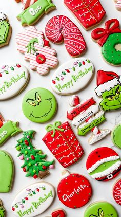 christmas cookies are arranged on a white surface