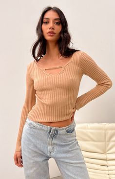 * Beige Long Sleeve Sweater   *     * HOW TO STYLE:   * Add this sweater top to your winter () essentials! Perfect for under a puffer and styled with jeans () or wear by itself and a mini skirt ().   *     * FEATURES:   * Long sleeve knit   * Lots of stretch   * Pull on style   * Unlined   * Gold chain detailing at centre bust   * Ribbed material   * Mid wight material Beige Long Sleeve, Prom Midi Dress, 60's Dress, Summer Playsuit, Sweater Crop, Beginning Boutique, Strapless Tops, Crop Top Sweater, Winter Essentials