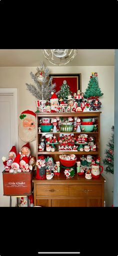 a shelf filled with lots of christmas items