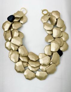 Matte gold, 4 strands of irregular flattened metal beads Luxury Hand-strung Statement Beaded Necklaces, Elegant Gold Multi-strand Bib Necklaces, Statement Gold Necklace, Resin And Clay, Original Necklace, Gold Statement Necklace, Full Look, Black Accents, Evening Attire