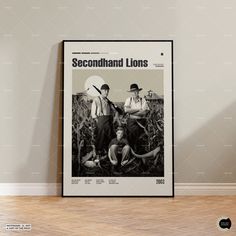 a poster with the words secondhand lions on it in front of a white wall