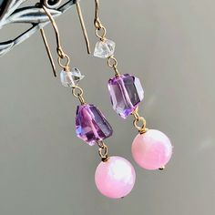 "6990 Kunzite Amethyst Herkimer Diamond Earrings Gold Filled wire wrapped natural gemstones bohemian statement long dangle drops birthday anniversary Valentine's day Mother's day Christmas holiday gift for her women mom sister wife girlfriend daughter niece aunt grandma cousin colleague best friend. Enjoy the beauty & power of natural gemstones. MATERIALS & DIMENSIONS ✦ Natural GEMSTONES: - KUNZITE, pale lilac, smooth round beads 10mm; - AMETHYST, deep purple, irregular cut beads approx. 10x9mm; Luxury Handmade Amethyst Earrings, Purple Kunzite Jewelry As A Gift, Gold Amethyst Gemstone Crystal Earrings, Handmade Purple Kunzite Jewelry, Garnet Necklace Gold, Faceted Pink Amethyst Jewelry, Kunzite Jewelry, Herkimer Diamond Earrings, Rose Quartz Earrings