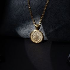 St Benedict medal necklace in 14 gold, Christian necklace for mama, Saint Benedict medal for wife, St Benedict cross Introducing our exquisite St. Benedict pendant, the perfect accessory for both men and women seeking protection and guidance. Crafted with utmost precision and attention to detail, this pendant showcases the iconic St. Benedict medal, known for its powerful symbolism against evil spirits and adversity. Made from high-quality materials, this pendant exudes a sense of timeless elega Gold Miraculous Medal Necklace Gift, Gold Miraculous Medal Round Pendant Jewelry, Gold Round Pendant With Miraculous Medal, Gold Miraculous Medal Pendant Necklace, Gold Pendant Charm Necklace With Miraculous Medal, Classic Gift Medallion Necklace Tarnish Resistant, Classic Tarnish Resistant Medallion Necklace For Gift, Classic Tarnish-resistant Medallion Necklace Gift, Personalized Gold Medallion Necklace Gift