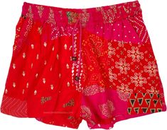 These red and pink sustainable, comfy, and unique shorts reflect love, passion, and desire.  The shorts comprise multiple pieces of recycled or leftover fabric sewn together. #tlb #JuniorPetite #beachwrap #Indian #Handmade #HippieShorts #BeachShorts #PatchworkShorts Red Short Length Bottoms For Festival, Red Short-length Bottoms For Festival, Red Patchwork Summer Bottoms, Red Patchwork Bottoms For Summer, Cotton Red Shorts For Festival, Pink Cotton Bottoms For Festival, Red Cotton Shorts For Festivals, Red Cotton Festival Shorts, Bohemian Short Pink Bottoms