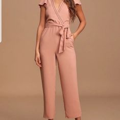 Nwt. Size Small Jumpsuit In Mauve/Pink With Short Flounce Sleeves, A Darted Bodice, And A Surplice Neckline, Trimmed With Pierced Crochet Details. Fitted Waist, With Tying Sash Belt, Wide-Leg Pants That End In Ankle-Length, Slightly Tapered Hems. Hidden Back Zipper/Clasp. -Currently Sold Out. -Fully Lined. -Self & Lining: 100% Polyester. Casual Pink Jumpsuits And Rompers For Date Night, Casual Pink Jumpsuits For Date Night, Pink Jumpsuits And Rompers For Date Night, Fitted Pink Jumpsuits And Rompers For Work, Fitted Pink Jumpsuits For Work, Pink Fitted Jumpsuit For Work, Pink V-neck Jumpsuits For Work, Pink V-neck Jumpsuit For Loungewear, Feminine Pink Jumpsuits And Rompers For Night Out