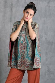 Beige pashmina jacket with handwoven paisley and floral motifs.
Component: 1
Pattern: Hand Woven
Type Of Work: Thread
Neckline: Band Collar
Fabric: Pashmina
Color: Beige
Other Details: 
Paisley and floral motifs
Sleeves with slits
Closure: Button front
Note: The pant worn by the model is not for sale
Occasion: Party - Aza Fashions Silk Pashmina Shawl For Fall, Elegant Paisley Print Pashmina Shawl For Fall, Traditional Paisley Print Shawl For Fall, Pashmina Shawl With Woven Motifs, Fall Pashmina Shawl With Paisley Print, Fall Paisley Print Pashmina Shawl, Pashmina Paisley Print Dupatta Shawl, Jamawar Pashmina Shawl With Paisley Print, Fall Paisley Print Shawl