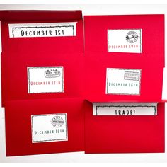 three red envelopes with labels on them and the words december written in black ink