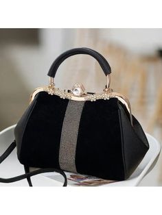 Imperial Black Lady Handbag – an accessory that seamlessly blends sophistication with practicality. Whether you're heading to the office, a social event, or a casual day out, this effortlessly adapts to your style. The versatility of its design allows you to pair it with a variety of outfits, making it a go-to accessory in your collection.Handbags Type: Shoulder BagsTypes of bags: Handbags & Crossbody bagsMain Material: PULining Material: PolyesterPattern Type: SolidInterior: Cell Phone PocketEx Luxury Black Handheld Evening Bag, Black Top Handle Box Bag For Office, Black Large Capacity Evening Bag, Black Spacious Evening Bag, Black Rectangular Office Bag, Black Large Capacity Bag For Party, Evening Satchel Bag With Adjustable Strap, Elegant Black Satchel With Large Capacity, Elegant Formal Bag With Adjustable Strap