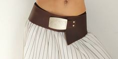 Brown leather, this leather belt is one of the best skins of the market, apart from the color so beautiful that it has is of great comfort, has body and is at the same time soft for comfort of wearing it, wonderful skin and wonderful design. The belt is a special form so that it adapts completely to the female body of women and to their hips and curves, belt is not straight but that will bend a little to adapt completely to the body. We have been selling the model in Spain for years and it is th Brown Leather Belt, Female Body, Great Design, Leather Belts, Good Skin, Leather Belt, Bend, Brown Leather, Spain