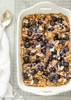 blueberry baked oatmeal in a white baking dish