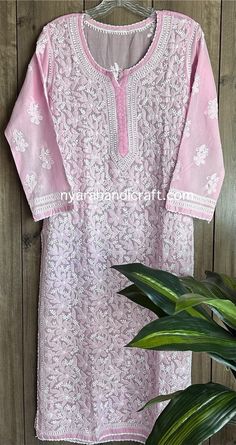 Soft cotton hand embroidered Kurta in a pretty pink color ! Paired with soft cotton lined pants in white. Sold separately. Kurta Length:46 inches Liner included Spring Pink Kurta With Cutdana, Pink Cutdana Kurta For Spring, Pink Long Sleeve Kurta With Cutdana, Pink Block Print Sets For Spring, Spring Pink Block Print Sets, Spring Block Print Pink Sets, Summer Pink Kurta With Cutdana, Fitted Pink Kurta With Block Print, Pink Cotton Block Print Set