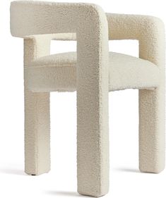 the chair is made out of sheepskin and has a rounded seat on one side