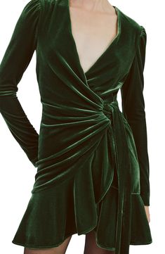 Gorgeous stretch velvet brings elevated texture to this party-approved faux-wrap mini featuring a cinching tie at the waist and a flouncy hem. 34 1/2" length (size 8) Hidden back-zip closure Surplice V-neck Long sleeves Attached waist tie Partially lined 95% polyester, 5% elastane Dry clean or hand wash, line dry Imported Pleated Cocktail Dress, Gatsby Formal Dress, Christmas Dress Green, Christmas Cocktail Dress, Holiday Cocktail Dress, Long Sleeve Dresses Fall, Cocktail Dress Holiday, Day To Night Dresses, Long Sleeve Cocktail Dress