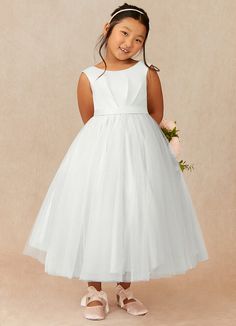 Bee is the perfect classy and cute ankle length dress for your flower girl. Her pleated satin bodice features a V-back and a simple belt. She also features a fluffy tulle skirt to make her feel like a princess. Petal Flower Girl Dress, Pleated Tulle Dress, Tea Length Flower Girl Dress, Flower Girl Dresses Vintage, Simple Belt, Neutral Dresses, White Dress Top, Bridal Party Attire, Bee Flower