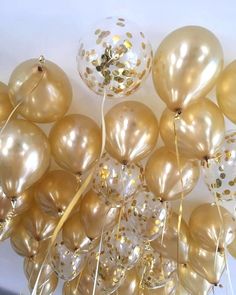 gold balloons with confetti and streamers in the middle are featured for home & garden essentials