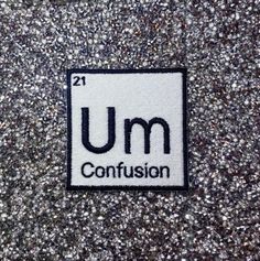 the symbol for umm confusion is shown in black and white on a gray background