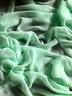 "1 mtr mint green chiffon fabric This is quality chiffon fabric It is 45\" wide (114cm) This is ideal for dress making,bridal dress, veils,decorations,and many other projects If more than one quantity is bought it will be sent in one continous length I also combine postage costs if multiple items are bought Any questions feel free to ask" Bridal Horseshoe, Tutu Decorations, Pink Wedding Theme, Mint Green Dress, Dried Rose Petals, Bridal Fabric, Soft Dress, Dress Chiffon, Blossom Design