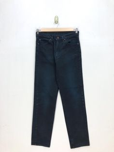 Vintage Levi's Jeans Levis 606 Denim Levis Faded Black Pants - BS47542.  Manual Measurement (laying in flat area):  1) Waist: 31 inch.  2) Rise: 12 inch.  3) Hips: 20 inch.  4) Tight: 10.5 inch.  5) Outseam: 40.5 inch.  6) Inseam: 29.5 inch.  7) Leg opening: 7 inch.  Made in: JAPAN.  Fabric Material: 100% Denim Cotton.  Condition: In good vintage condition overall.  Please check all the measurement to insyre a proper fit.  Remember to allow yourself some extra room for movement.  You can compare Vintage Straight Leg Bottoms For Fall, 90s Denim Blue Straight Leg Jeans, 90s Straight Leg Denim Blue Jeans, Vintage Straight Bottoms For Fall, Vintage Medium Wash Tapered Leg Pants, Retro Faded Straight Leg Jeans, Vintage Tapered Leg Pants In Medium Wash, Vintage Relaxed Fit Straight Leg Bottoms, Vintage Straight Leg Bottoms With Relaxed Fit