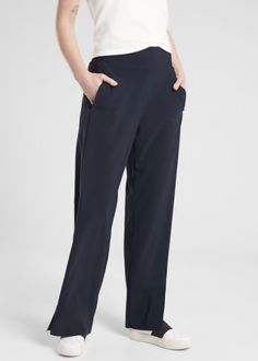 Athleta Cosmic Pant  Wide Leg Work Travel  NAVY (FIRST PICTURE) SIZE S #351089 NEW WITH TAGS $118.00   FIT & SIZING Relaxed with room to move with a high-rise waistband Inseam: Regular: 32 Petite: 30 Tall: 35 PRODUCT DETAILS FOR: Commuting, work and travel FEEL: Eurojersey fabric is smooth and lightweight with subtle stretch for mobility FAVE: Flat-front waistband flatters your form Two secure front-zip pockets #531089 FABRIC + CARE Nylon/Spandex BREATHABLE. Sweat can easily move through the fab Olive Green Pants, Work And Travel, Wardrobe Planning, Flared Leggings, Leg Work, Ponte Pants, Stretchy Pants, Flare Leg Pants, Athleta Pants