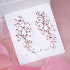 "Very romantic crystal bridal earrings. Gorgeous crystal wedding earrings for bride or bridesmaids. Matching necklace and bracelet will complete your bridal jewelry set. This wedding jewelry set is available in silver, gold or pink gold(rose gold) color to match your dress. They measure about 1 1/2\" long and 1/4\" wide. Matching regular bracelet is measuring: 7\" long and 1/4\" wide or adjustable bracelet option is available as well to fit a larger wrist. High quality guaranteed by GlamourBride Rose Gold Crystal Jewelry For Wedding, Rose Gold Crystal Earrings For Anniversary, Glamorous Rose Gold Jewelry For Wedding, Sparkling Rose Gold Earrings For Wedding, Rose Gold Cubic Zirconia Bridal Earrings For Wedding, Glamorous Rose Gold Wedding Jewelry, Rose Gold Crystal Bridal Earrings For Gift, Rose Gold Crystal Drop Bridal Earrings, Sparkling Rose Gold Crystal Earrings For Wedding