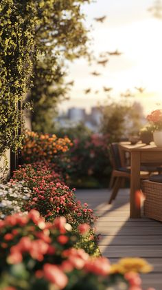 the sun shines brightly on an outdoor patio with flowers and potted plants in the foreground