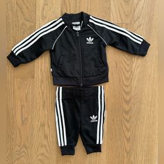 Nwot Adidas Infants Superstar Tracksuit Color: Black And White Size 3m Never Been Worn! Perfect Condition. Adidas Fitted Playwear Sets, Adidas Fitted Sets For Playwear, Adidas Black Long Sleeve Set, Adidas Black Fitted Sets, Fitted Black Adidas Sets, Adidas Black Sports Sets, Reborn Clothes, Adidas Baby, Tracksuit Outfit