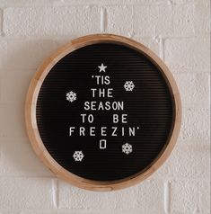 a black and white sign that says tis the season to be freezein'd