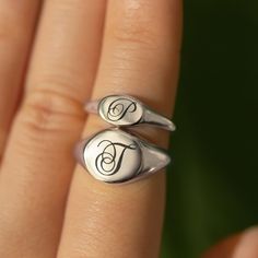 Our stunning oval signet ring is the perfect addition to any jewelry collection, with an unqiue engraving that brings a personal touch to this timeless piece. Sterling Silver Hypoallergenic, lead and nickel free Made in NYC Side Oval width 8mm x Height 5mm Band Thickness 2mm #R009-S Silver Initial Ring, Oval Signet Ring, Script Initial, Engraved Ring, Stylish Rings, Initial Ring, Engraved Jewelry, Engraved Rings, Signet Ring