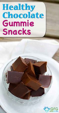 healthy chocolate gummie snacks in a glass bowl on a white plate with text overlay