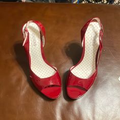 Never Worn. Never Used. Great Condition. Red Open Toe Heels With 4-inch Heel, Red Classic Sandals With Round Toe, Classic Red Round Toe Sandals, Classic Red Sandals With Round Toe, Red Evening Sandals With Deep Heel Cup, Classic Red Heels With Red Sole, Red Heels For Evening, Red Medium Width Heels For Evening, Formal Red Round Toe Heels