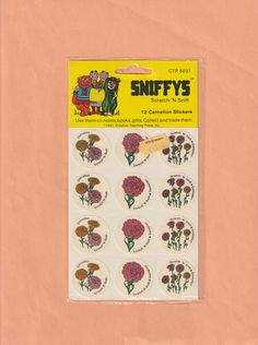 a sheet of stickers with flowers and bears on them in the shape of letters sniffy's